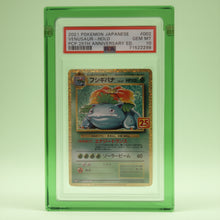 Emerald Green Card Guard on an emerald background, holding a PSA graded Venusaur slab
