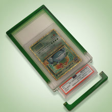 Emerald Green Card Guard open on an emerald background with the PSA slab lifting out