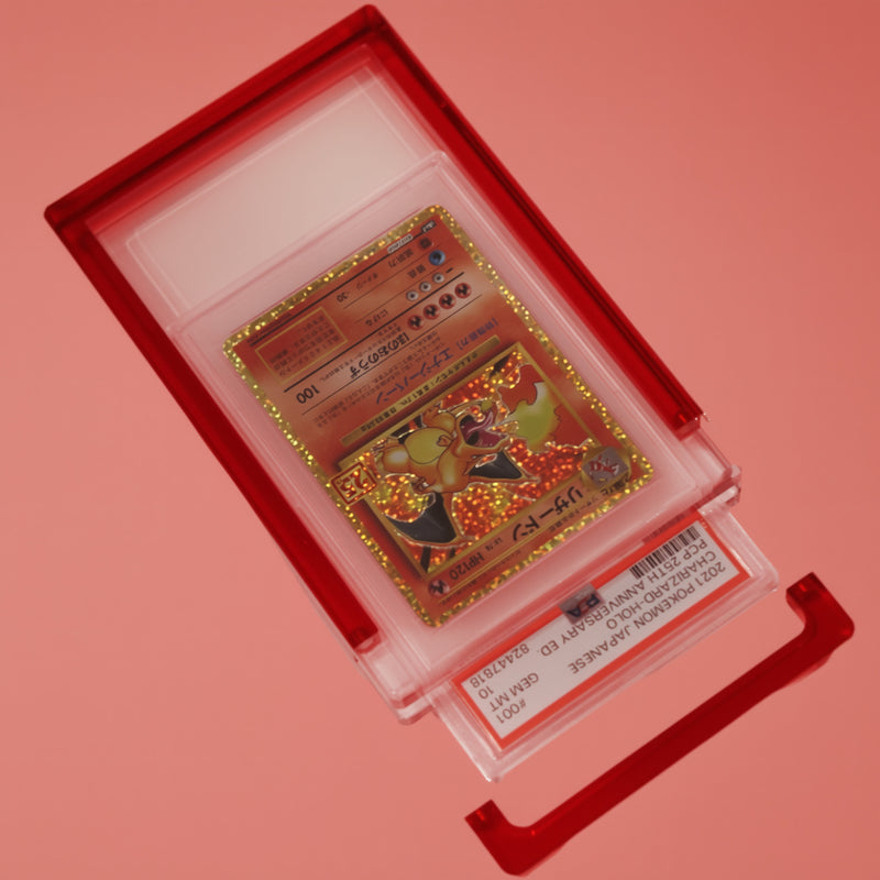 Ruby Red Card Guard open on a ruby background with the PSA slab lifting out